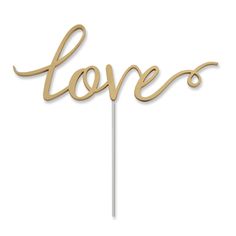 a cake topper with the word love on it