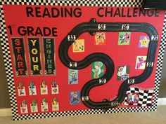 a bulletin board that has a race track on it and the words reading challenge 1 grade