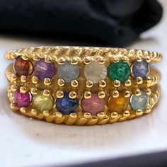 BEAUTIFUL Estate 14K Yellow Gold Multi Gemstone MOTHERS RING Size 7  Gorgeous vintage ring! Crafted expertly in solid 14k yellow gold, with twelve (12) assorted multi colored gemstones! * Weighs 6.1 grams * Ring measures approximately 9mm at widest point * Size 7 Please message me with any questions Shipped FAST and FREE, fully insured and in a gift box :) I guarantee item to be exactly as described and pictured. Mothers Ring, Colored Gemstones, Gold Apple, Mother Rings, Ring Pictures, Gold Gift, Ring Crafts, Black Gift Boxes, Cross Charms