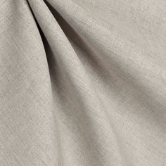 a close up view of the side of a grey fabric