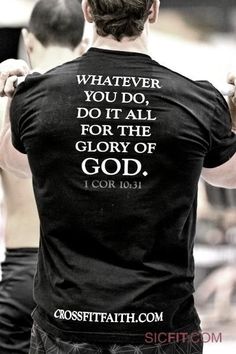 a man with his back to the camera, wearing a t - shirt that says whatever you do, do it all for the glory of god