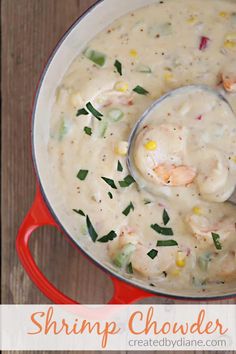 shrimp chowder in a red pot with a spoon