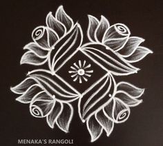 a black and white drawing of a flower with the words menka's rangoli on it