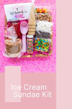 an ice cream sundae kit in a pink basket with sprinkles and confetti