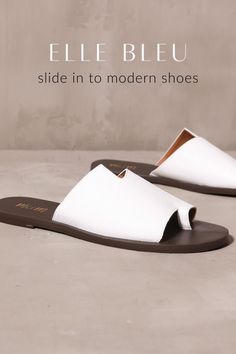 elle bleu, slide in to modern shoes, white back toe you slide sandals on cement background Toe Separator, Slipper Sandals