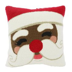 a santa claus face pillow is shown on a white background with red trimmings