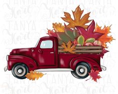 an old yellow truck with fall leaves and acorns in the bed is shown