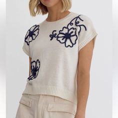 Brand New Size S By Entro White Short Sleeve Sweater With Navy Floral Embroidery White Sweater With Floral Embroidery, White Casual Sweater With Floral Embroidery, Cream Crew Neck Top With Floral Embroidery, Casual Cream Top With Floral Embroidery, Casual Cream Floral Embroidered Top, Casual Cream Embroidered Top With Floral Design, Casual Cream Embroidered Tops, Embroidery Sweater, Floral Sweater