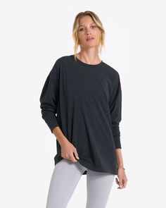 An impossibly lightweight tee, made possible. Weightless as a feather with surprisingly great coverage, this relaxed long sleeve tee perfects that not-wearing-anything feeling. | Vuori Long-Sleeve Feather Tee | Washed Black | Medium Vuori makes premium performance apparel inspired by the active Coastal California lifestyle; an integration of fitness, surf, sport, and art. Breaking down the boundaries of traditional activewear, we are a new perspective on performance apparel. Coastal California, California Lifestyle, Christmas 2022, Fashion Deals, Performance Outfit, New Perspective, Black Media, S Models, Long Sleeve Tee