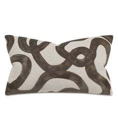 a brown and white pillow on a white background