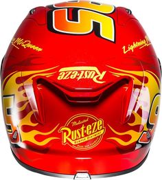 the helmet is red and yellow with flames on it