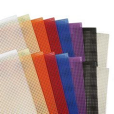 four different colors of perfored plastic sheets