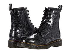 Dr. Martens Kid's Collection 1460 (Big Kid) - Kid's Shoes : Black Cosmic Glitter : Their edgy still is sure to take charge in the durable Dr. Marten's Kid's Collection 1460 Boot. These classic ankle boots feature an iconic eight-eyelet, lace-up closure and side-zip opening with a pull tab heel for easy entry. Superbly-soft leather upper with combined leather lining and breathable footbed. Goodyear welt construction heat seals and sews the upper and sole together for superior flexibility and long Dr Martens Aesthetic, Dr Martens Black, Stylish Boots, Comfortable Boots, Goodyear Welt, Eyelet Lace, Business For Kids, Kids Boots, Big Kid