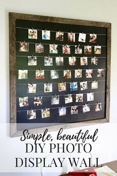 a blackboard with pictures hanging on it and the words diy photo display below