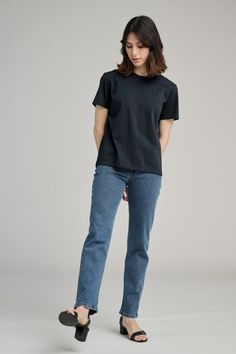 Cemented as the #1 womens’ essential by Jane Birkin in the 60's and 70's, The T-Shirt is the natural starting place for our growing permanent collection of women's essentials. Developed for longevity, both aesthetically and physically, our T-Shirt is made from a soft yet substantial mid-weight organic cotton jersey, designed to feel light without being frail or see-through. It's cut to a classic fit and accentuated with a slightly elevated, neatly ribbed neckline. Tuck it into a skirt, or make i T Shirt Cut, Jane Birkin, Women Essentials, Organic Cotton Fabric, Ribbed Neckline, Dark Navy, Portugal, Loose Fitting, Normcore