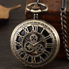 Discover the enchantment of a bronze pocket watch - a true work of art with intricate gears and exquisite craftsmanship. This automatic mechanical timepiece promises accurate timekeeping and captivates with its nostalgic charm. The perfect anniversary gift that embodies timeless elegance and cherished memories. A leather pouch case is also available separately, which can be personalized with a name or monogram: https://www.etsy.com/listing/192350119/leather-pouch-for-pocket-watch INTERNATIONAL O Pocket Watch With Gears, Steampunk Pocket Watch, Chain Watch, Roman Numbers, Vintage Skeleton, Watch Pocket, Custom Strap