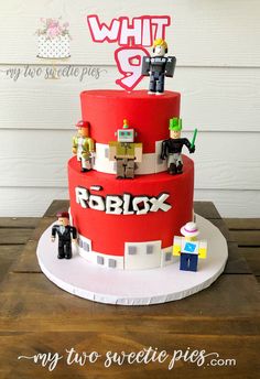 this is a cake made to look like roblox and his friends are on top