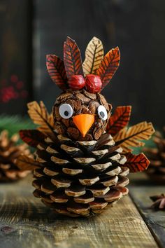 a pine cone with a turkey face on it