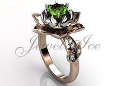 a green diamond ring with leaves on it