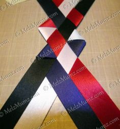 a red, white and blue ribbon on a table