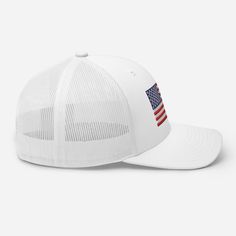 Show off your American pride with our America Flag Trucker Hat! This classic white hat features a vibrant embroidered American Flag on the front, making it a standout piece for any patriotic event. Designed with a breathable mesh back and an adjustable snap closure, this Patriotic trucker hat ensures all-day comfort and a perfect fit. Whether you're at a summer barbecue, out on a hike, or simply running errands, this hat is perfect for showing your patriotism year-round. Show your love for the U Patriotic Hats, Summer Barbecue, America Flag, White Hat, American Pride, Classic White, Running Errands, Snap Closure, American Flag