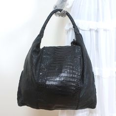 Pre-Loved. Light Wear On Bottom Corners. A Few Smudges May Come Out With A Professional Cleaning. Lining Is A Little Dusty. Does Not Come With Dustbag. *Silver Hardware. Zips* Bag Height 17.5" Bag Length 20.75" Bag Depth 5.25" Strap Drop 12.5" Designer Black Crocodile Pattern Bag, Luxury Black Textured Leather Hobo Bag, Designer Black Shoulder Bag With Crocodile Pattern, Crochet Hobo Bag, Hobo Crossbody Bag, Toiletry Pouch, Floral Bags, Crocodiles, Large Shoulder Bags