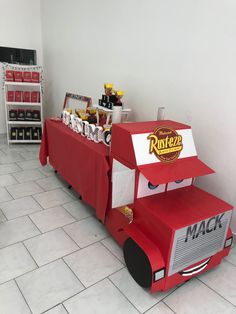 a food cart made to look like a mcdonald's truck is on the floor