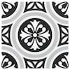 a black and white tile with an ornate design