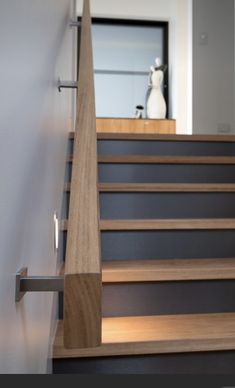 the stairs are made of wood and metal