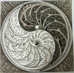 a drawing of a circular object with intricate designs on it