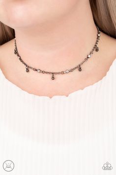 This edgy gunmetal custom choker set comes with a necklace and complimentary earrings, upgraded earrings, a clasp bracelet, and a ring with a stretchy back. Necklace - "What A Stunner": Featuring sleek fittings, dainty white rhinestones link with sections of glistening gunmetal chain around the neck. Shiny gunmetal beads dangle from the chain for a flirtatious finish. Features an adjustable clasp closure. Includes one pair of matching earrings. Upgraded earrings - "Fiercely Flauntable": Rows of Black Choker Necklace, Rhinestone Choker, Ball Necklace, Black Choker, Paparazzi Accessories, White Rhinestone, Black Necklace, Paparazzi Jewelry, Bracelet Clasps