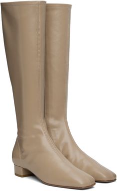 Knee-high grained leather boots in taupe. · Square toe · Zip closure at inner side · Covered block heel with rubber injection · Leather sole · Heel: H1 Supplier color: Taupe Beige Leather Knee-high Boots Medium Width, Beige Calf Leather Boots With Reinforced Heel, Beige Leather Knee-high Boots With Comfort Fit, Beige Leather Knee-high Heeled Boots, Modern Beige Calf Leather Boots, Beige Leather Knee-high Boots For Work, Modern Beige Leather Heeled Boots, Beige Calf Leather Heeled Boots With Round Toe, Beige Leather Platform Boots With Block Heel