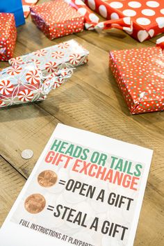 there is a sign that says heads or tails gift exchange open a gift = steal a gift