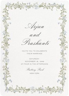 an ornate frame with flowers and vines is the centerpiece of this elegant wedding card