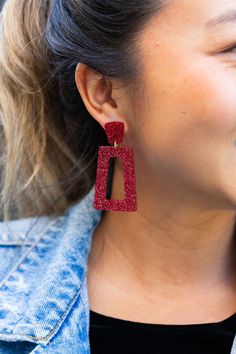 Get ready to bring the glam to your game day style with the Avery. These statement earrings are sure to make a bold statement and add a touch of sparkle to your look. Hypoallergenic stainless steel posts 20mm stud size Lightweight and durable glitter acetate acrylic Red Glitter Earrings For Party, Red Glitter Party Earrings, Red Glitter Jewelry For Party, Studded Necklace, Digital Gift Card, Digital Gifts, Gift Card Shop, Red Glitter, Bridal Hair Accessories