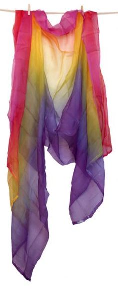 a multicolored scarf hanging on a clothes line