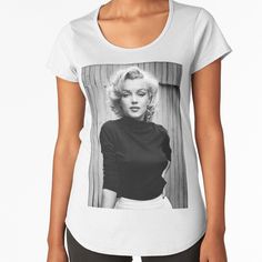 Regular fit t-shirt with scoop neck, capped sleeves, and curved hem for style. Solid colors are 100% cotton, heather colors are cotton blend. Range of colors available, with the option to print on front or back. Size range XS-XL. Marilynn Monroe Black and White Portrait. Trendy Cotton Scoop Neck T-shirt, Modern Fitted T-shirt With Graphic Print, Casual Black Top With Scoop Back, Trendy Cotton T-shirt With Scoop Neck, Trendy Scoop Neck Cotton T-shirt, Fitted Tops With Graphic Print And Scoop Neck, Trendy Scoop Neck Top With Graphic Print, Trendy Scoop Neck Tops For Streetwear, Casual Graphic Print Scoop Neck Top