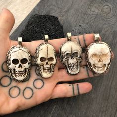 Unique and powerful double sided pendant, made with a skull made out of carved bone, and unique alloy metal designs around it and on its back. The back of the pendant has an embossed flower. The Pendant comes with a black leather cord, but you may choose to wear it with any chains that you already have as the bail is 1cm- 0.40 inch in diameter. The skull pendant itself is 5cm- 2 inch long 2.5cm- 1 inch wide A unique addition to your jewelry collection ⚡️GET 20% OFF by joining Akashi's VIP List ⚡ Halloween Skull Jewelry In Bone Color, Halloween Skull Shaped Bone Jewelry, White Skull Print Jewelry, White Skull Jewelry For Day Of The Dead, White Bohemian Skull Jewelry, White Gothic Skull Jewelry, Skull-shaped Bone Jewelry For Gifts, Bone-colored Skull Jewelry For Gift, Skull Shaped Bone Colored Jewelry For Gifts