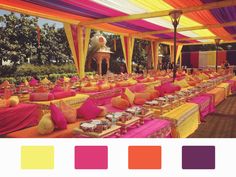 the tables are covered with bright colored linens