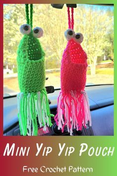 two crocheted stuffed animals sitting on top of a car dashboard with the words mini yip pouch free crochet pattern