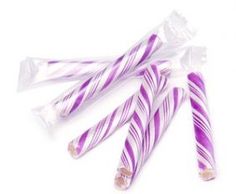 purple and white striped candy sticks on a white background