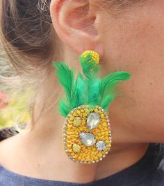 "These unique earrings are the perfect statement piece for any donut lover! Our unique, kitschy earrings feature gorgeous seed beading to look like a sprinkle donut in your choice of coloring! They also have a stunning, beaded round post. Choose your color at checkout! Measurements are approximately 2.25\"	is_active	18888049	Apparel & Accessories > Jewelry > Earrings	https://www.etsy.com/listing/810826230/beaded-donut-earrings-sprinkle-doughnut	jewelry > earrings > dangle_earring Yellow Fun Earrings For Party, Fun Green Beaded Earrings For Party, Summer Party Beaded Jewelry, Fun Yellow Party Jewelry, Fun Beaded Party Jewelry, Kitschy Earrings, Sprinkle Doughnut, Donut Earrings, Tropical Gifts