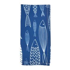 a blue dish towel with fish on it