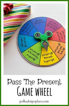 a game wheel with the words pass the present on it