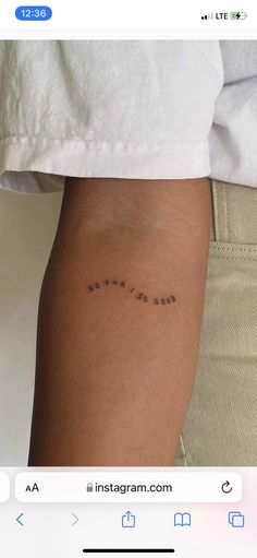 a woman's arm with the word love on it