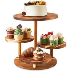 three tiered wooden trays holding cakes and pastries