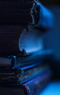 a stack of books sitting on top of each other