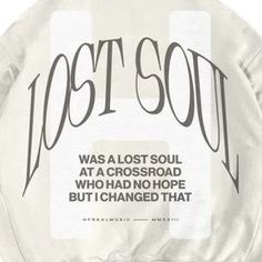 a white plate with the words lost soul written in black on it and an image of a crossroad