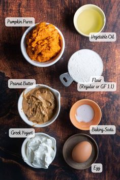 the ingredients for pumpkin pie laid out in bowls on a wooden table, including eggs, flour, butter, and sugar