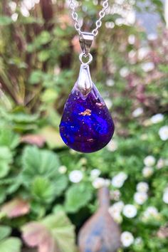 .  Rich shades of purple In this pendant necklace with shimmery accents